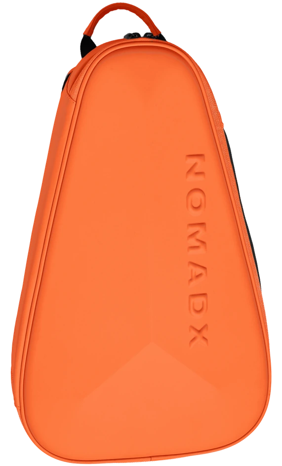 NomadX Hardshell Padel Backpack in Sunset Orange, standing upright, three-quarter view